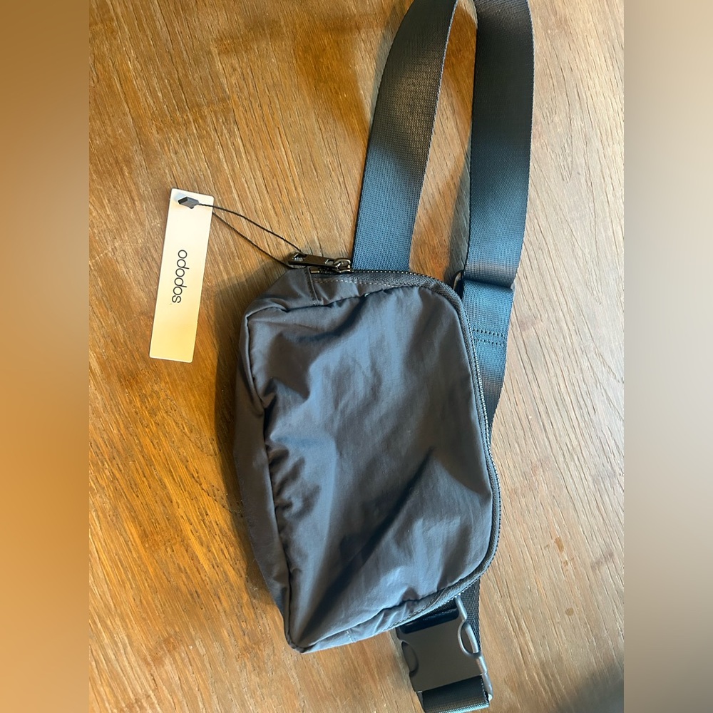 Mini belt bag. Almost identical to Lululemon mini belt bag. Brand new.